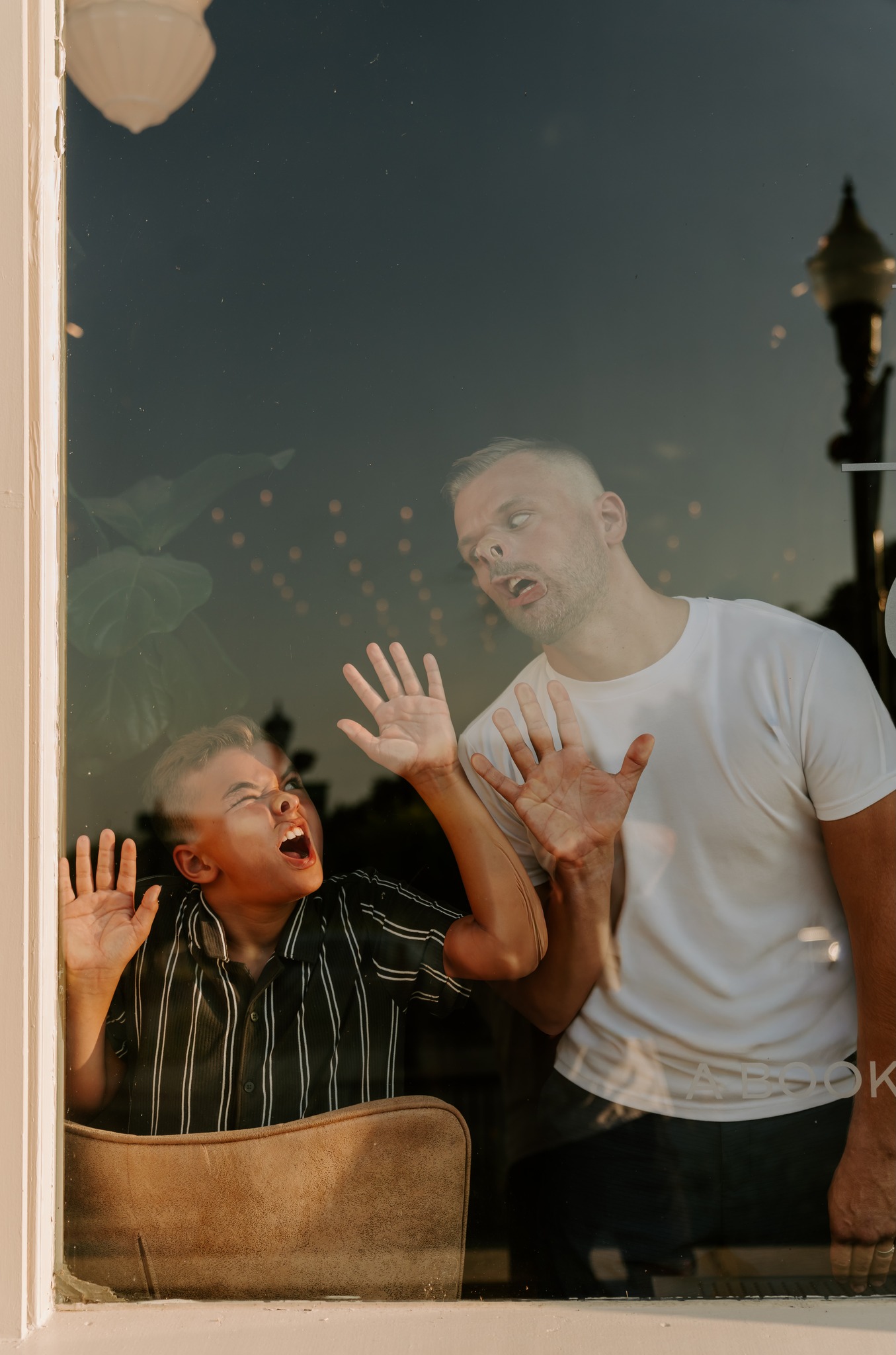 Samuel being silly with his son